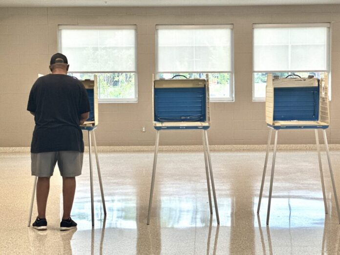 Voting at the Falling Creek Middle School precinct in Chesterfield County in the June 17, 2025, primary elections. (Photo by Markus Schmidt/Virginia Mercury)