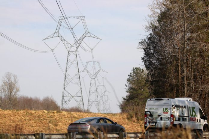 Existing transmission lines run through Goochland and Louisa counties. The support structures are similar to those that would be used for Valley Link. (Photo by Charles Paullin/Inside Climate News)