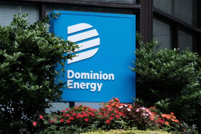 A sign outside of a Dominion Energy office building in downtown Richmond. (Photo by Ned Oliver/ Virginia Mercury)