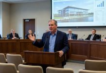 Resident Questions Rosslyn Boathouse Funding in Arlington County Meeting