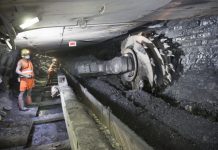 Black lung cases surging again in Southwest Virginia, Appalachia; miners blame blocked regulations Coal miners working underground with heavy machinery in a mine