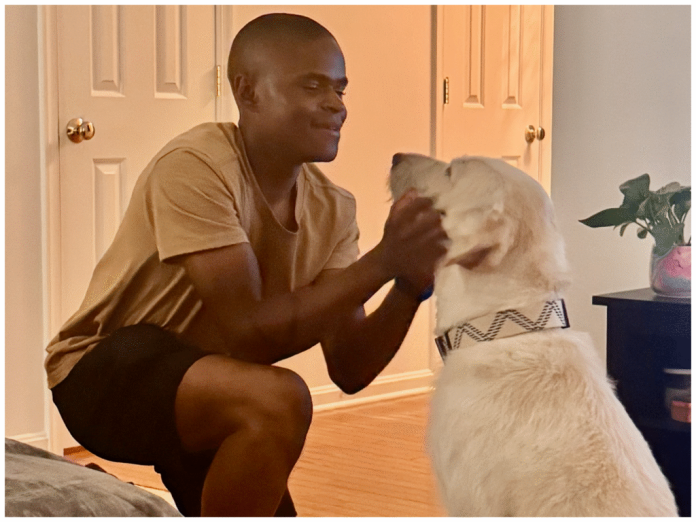 Marine Corps. Reserves Pfc. Samuel Compail of Massachusetts, with his dog Chopper. Fredericksburg resident Wendy Weldon is fostering Chopper during Compail’s deployment. (Photo courtesy Wendy Weldon)